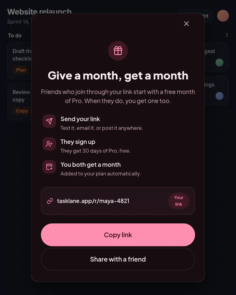 A popup over a task board titled Give a month, get a month, with a personal invite link and a Copy link button